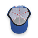 Blue baseball cap with a detailed interior design on a white background