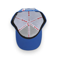 Blue baseball cap with a detailed interior design on a white background